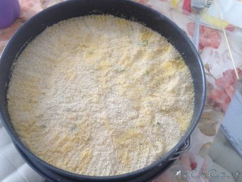 Strato di composto con pangrattato